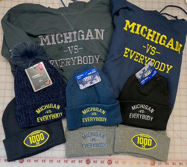 Michigan vs Everybody 1000th Win Gear Hoodies and Hats